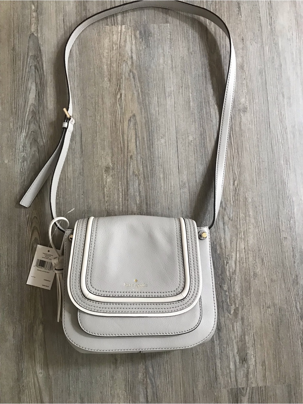 Kate Spade small tab leather crossbody bag